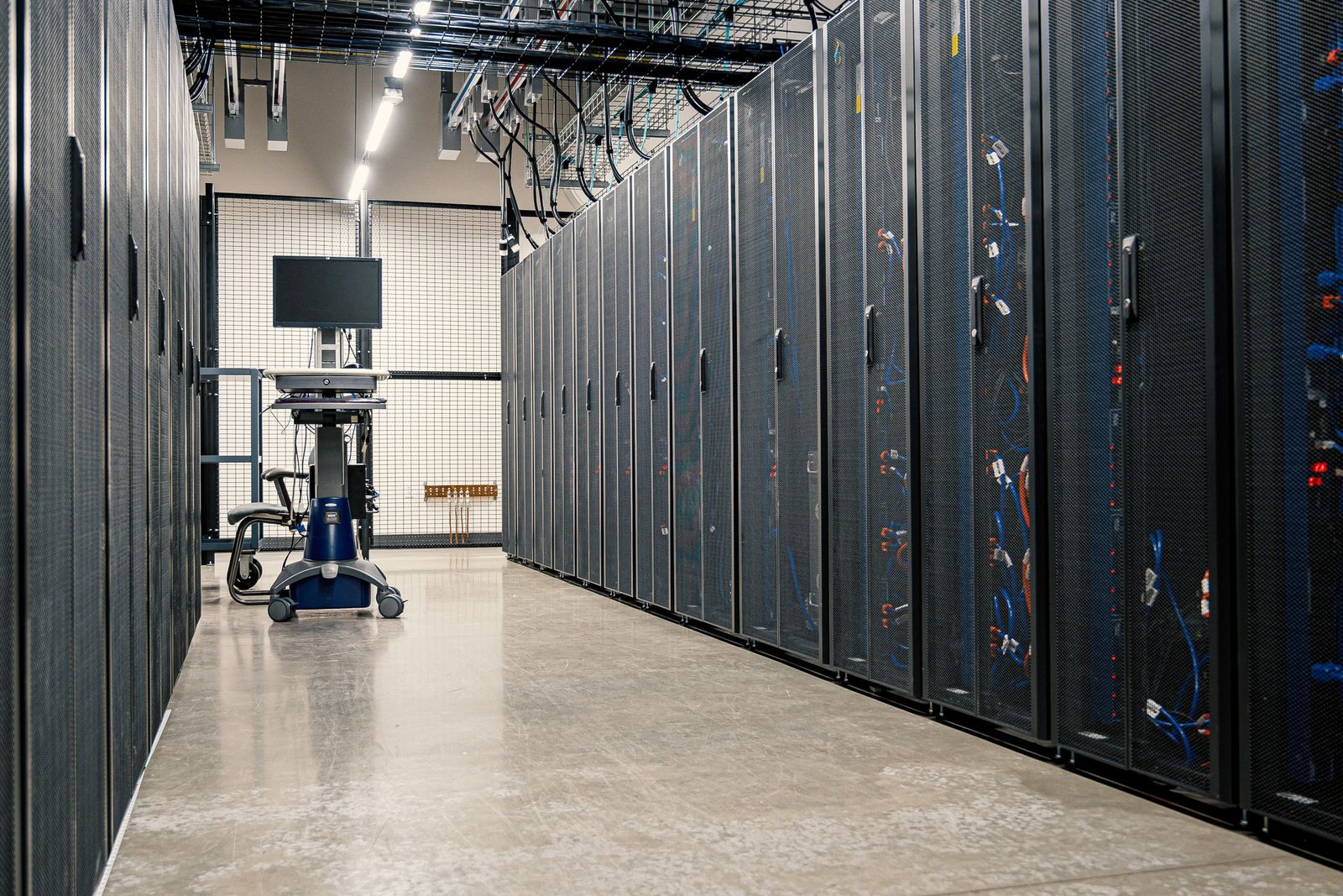 Server racks in a data centre — the operational half of delivering software